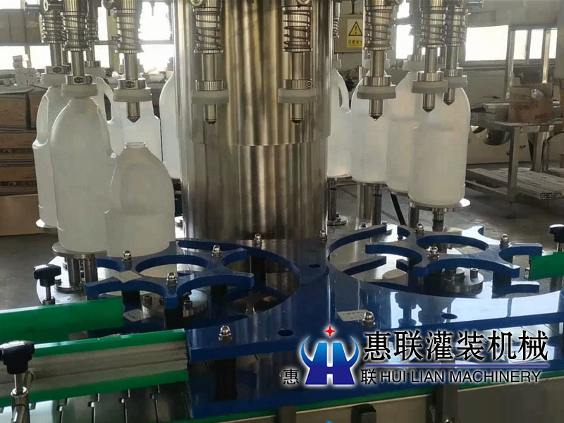 全自动负压液体灌装机 全自动负压液体灌装机